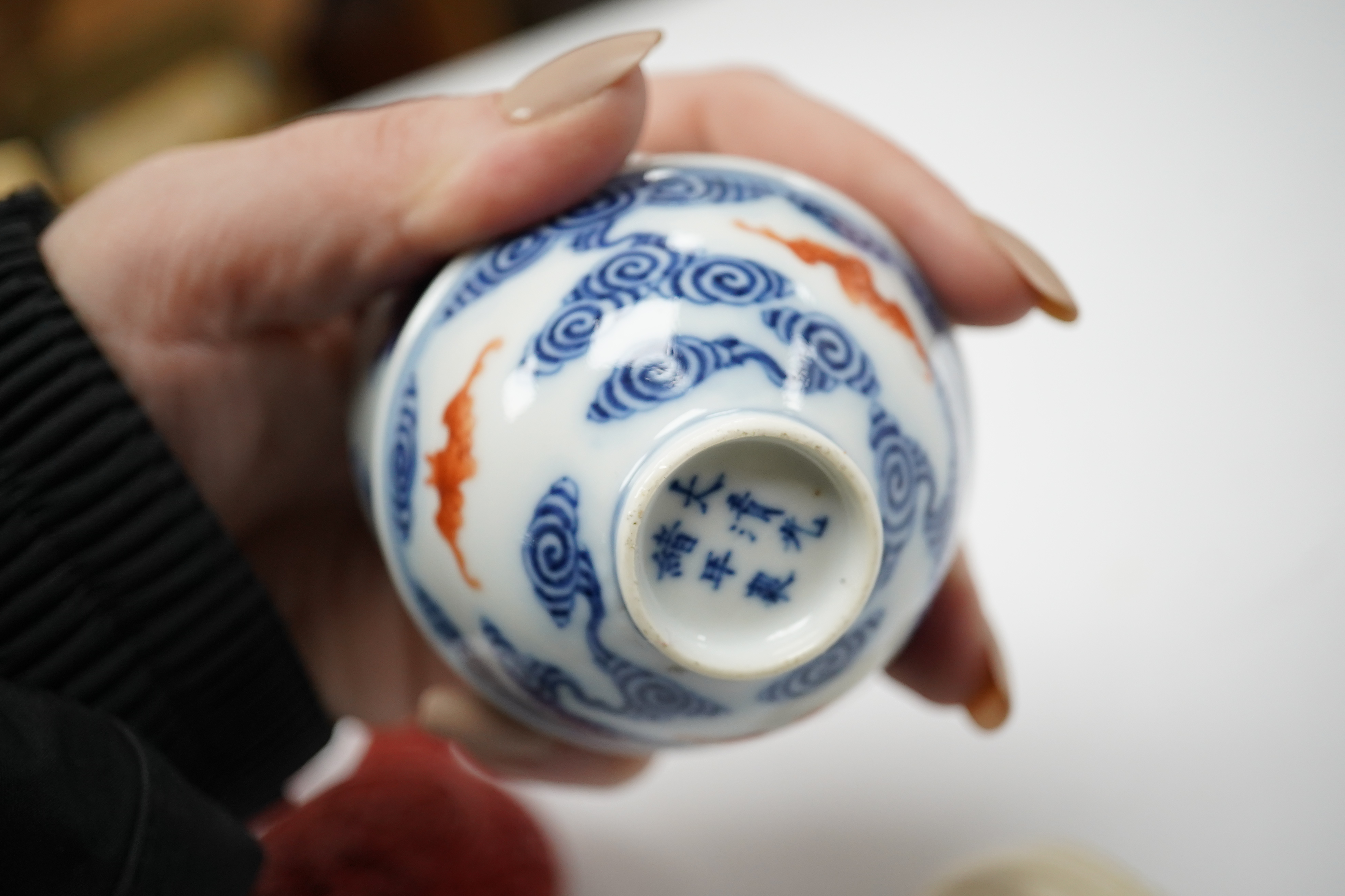 A Japanese blue and white seven sages of the bamboo grove joss-stick holder, 9.5cm high, four Chinese blue and white bowls, 19th/20th century and four other miscellaneous items. Condition - fair to good